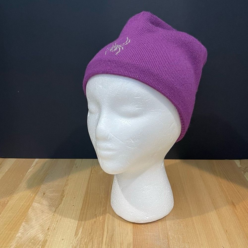 Spyder purple toboggan with rhinestone spider.